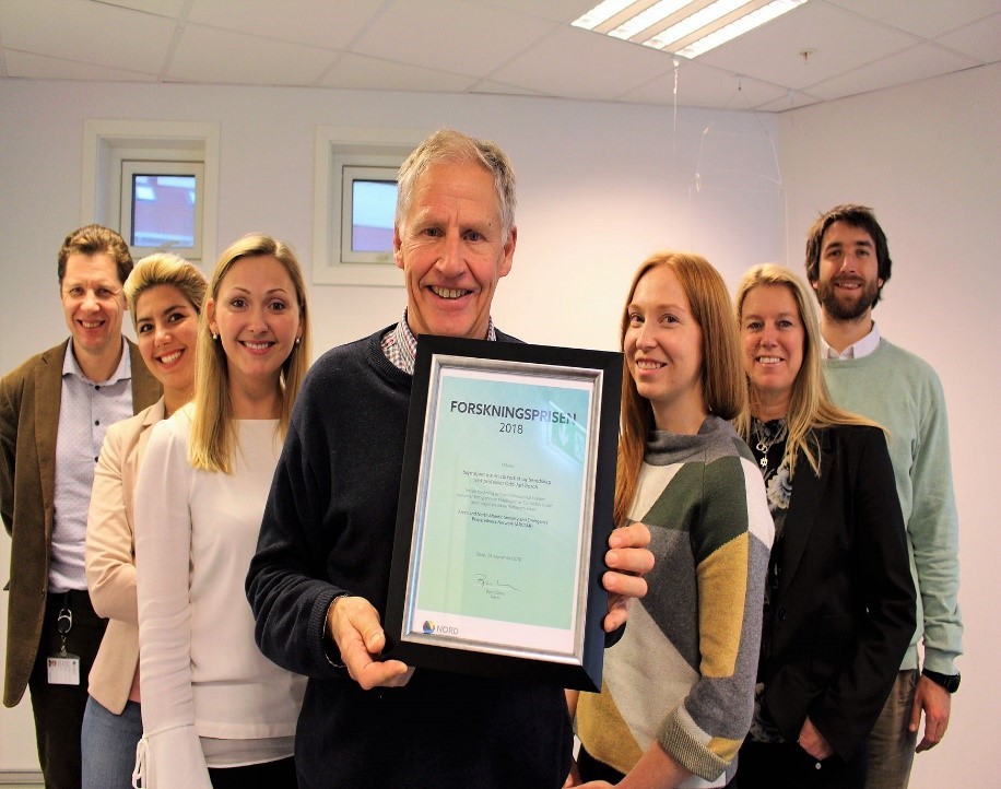 The authors (Borch in the middle and Andreassen to the left) together with their research team at the High North Center.